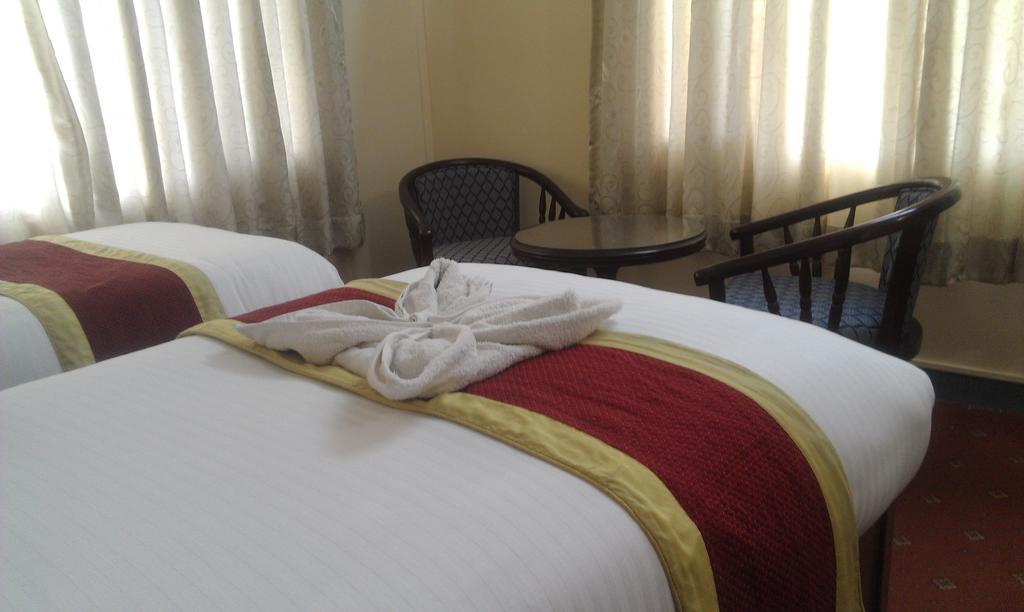 Amar Hotel Catmandu Quarto foto